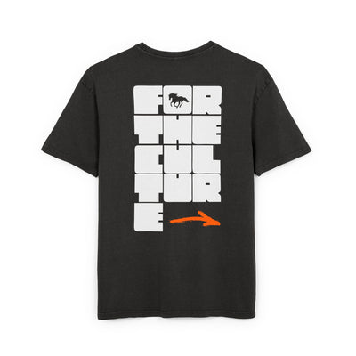 Back view of a mens acid washed oversized tee featuring bold lettering 'FOR THE CULTURE' in white on a black background.